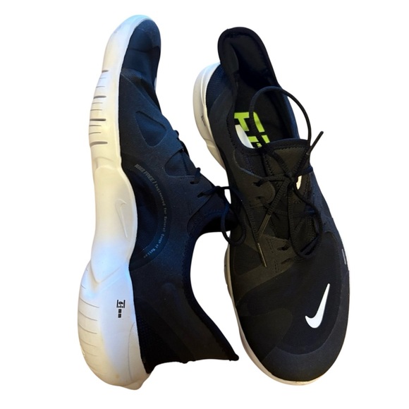 Nike Other - Nike Free Running Shoes Black and White Men's Athletic snug fit Shoes size 11